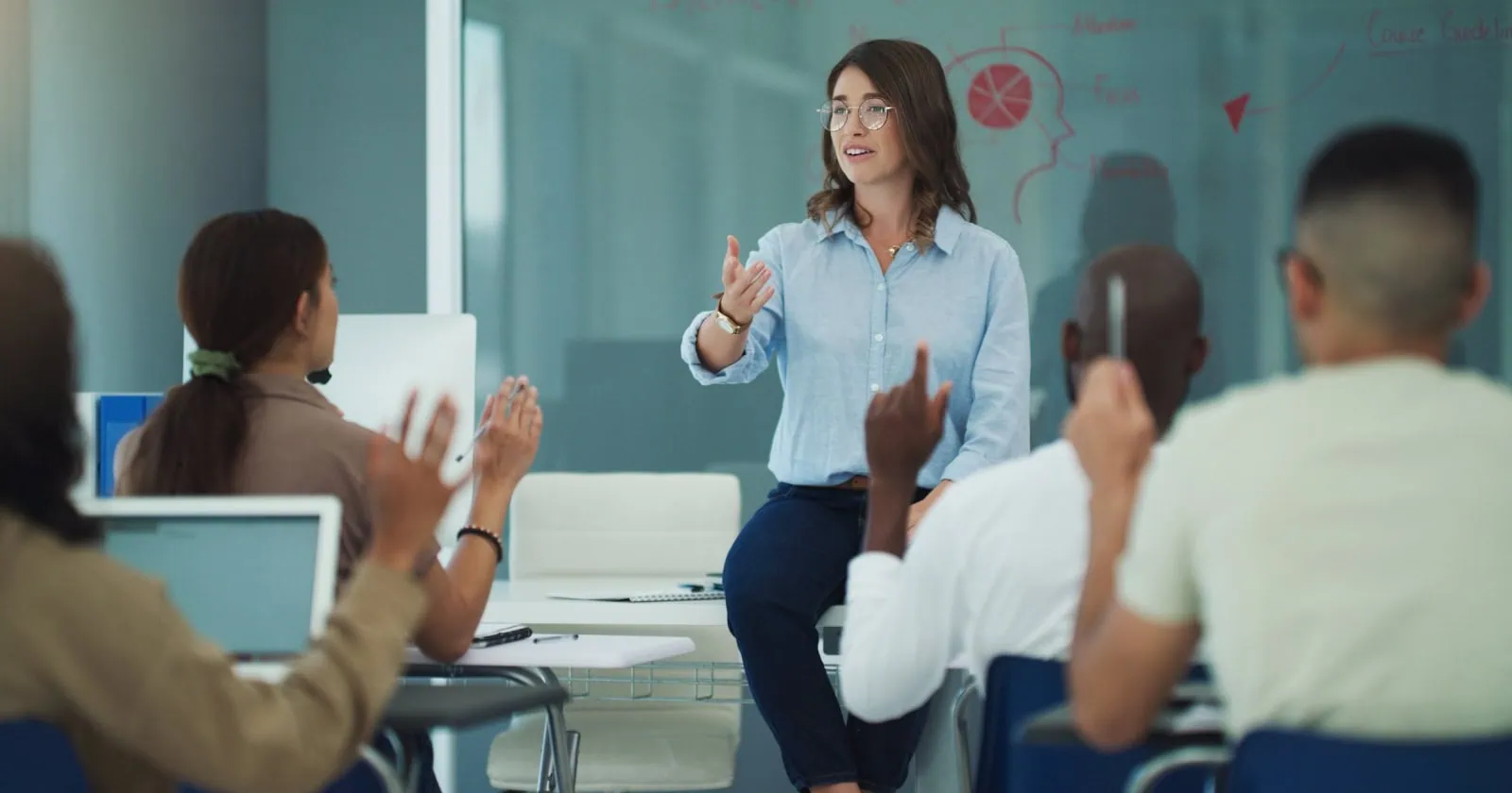 Woman teaching science students